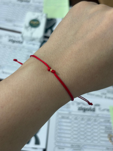 دستبند رداسترینگ به همراه گوی و دو گره